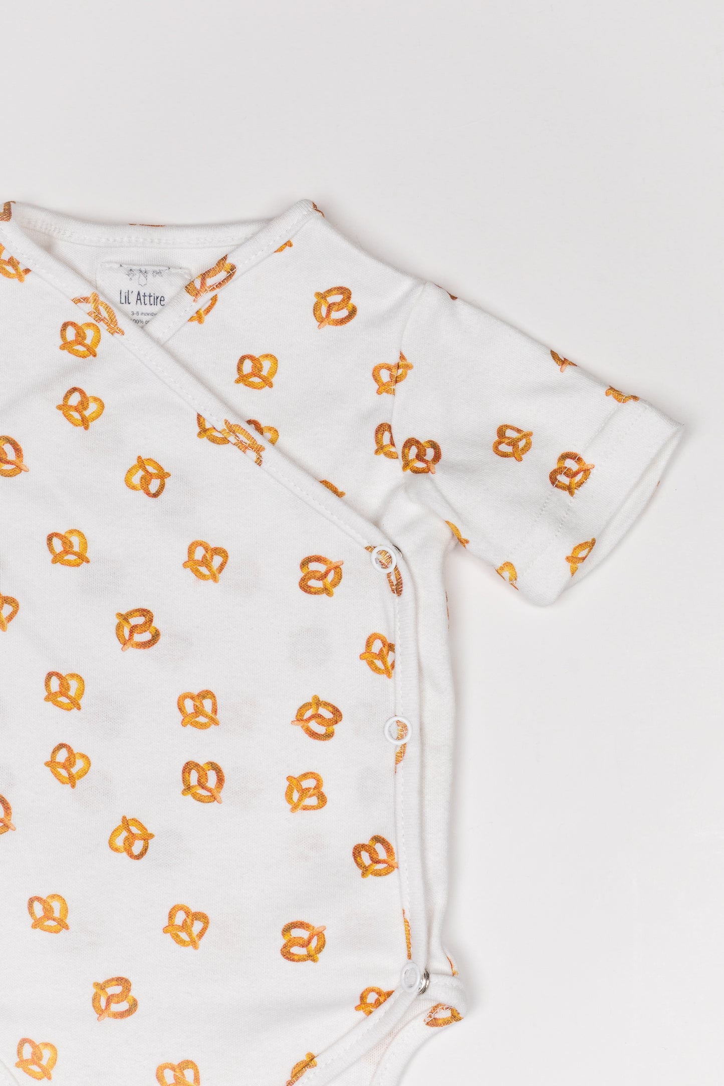 WRAP ROMPER - PRETZEL