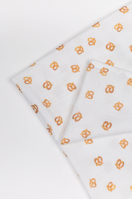MUSLIN SWADDLE BLANKET- PRETZEL